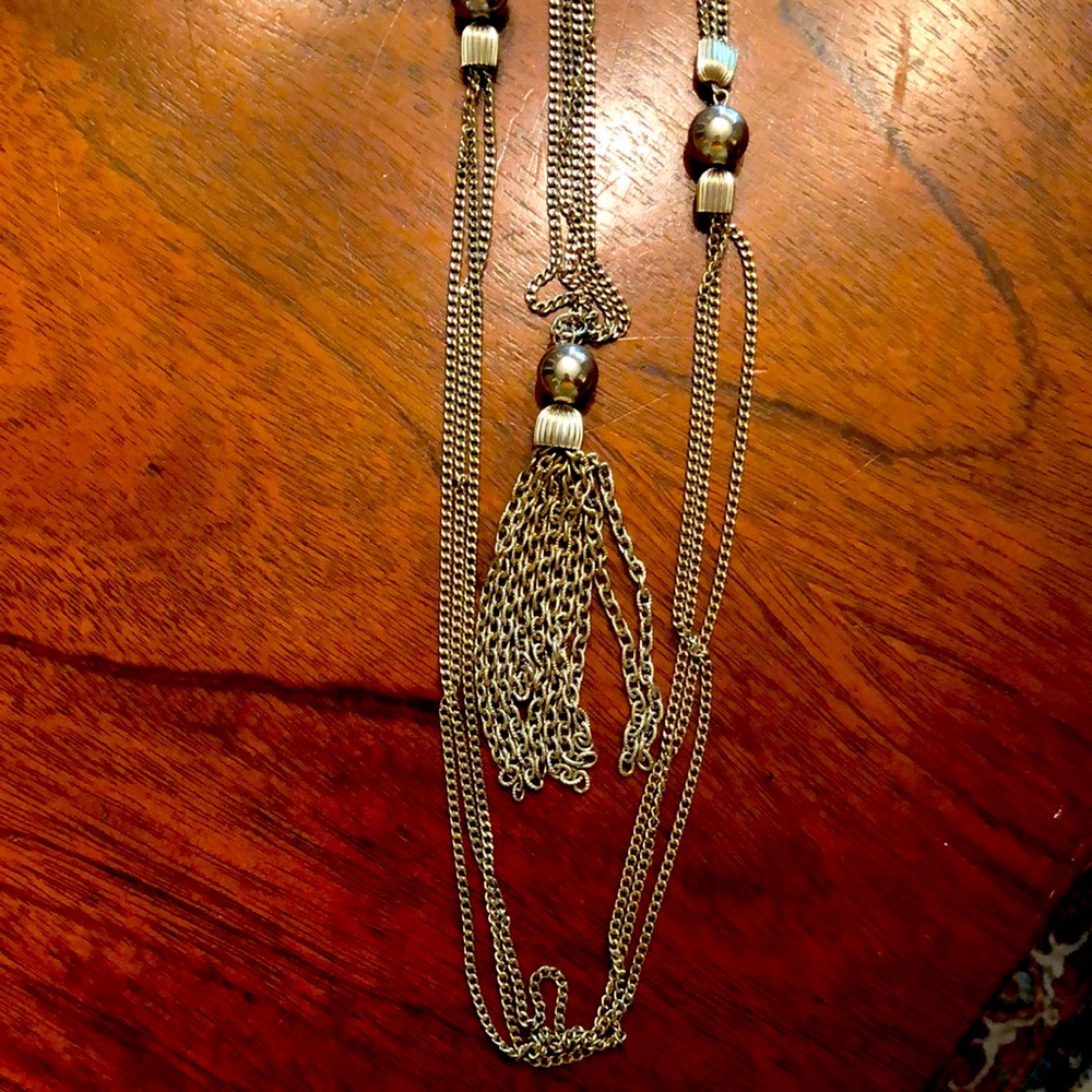Silver tone 19 inch necklace with tassel